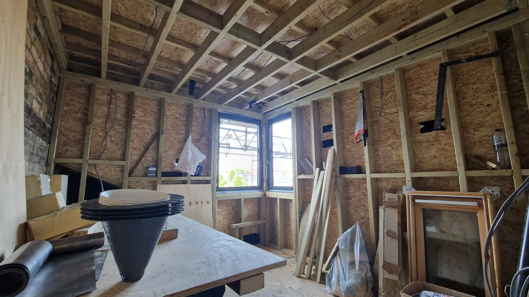 Internal timber and steel structure exposed during the Dundonald Road refurbishment