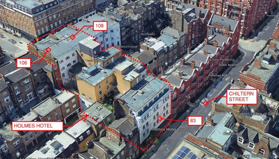 Annotated aerial view showing the extent of Holmes Hotel