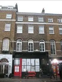 Existing frontage of 106 Baker Street forming part of Holmes Hotel