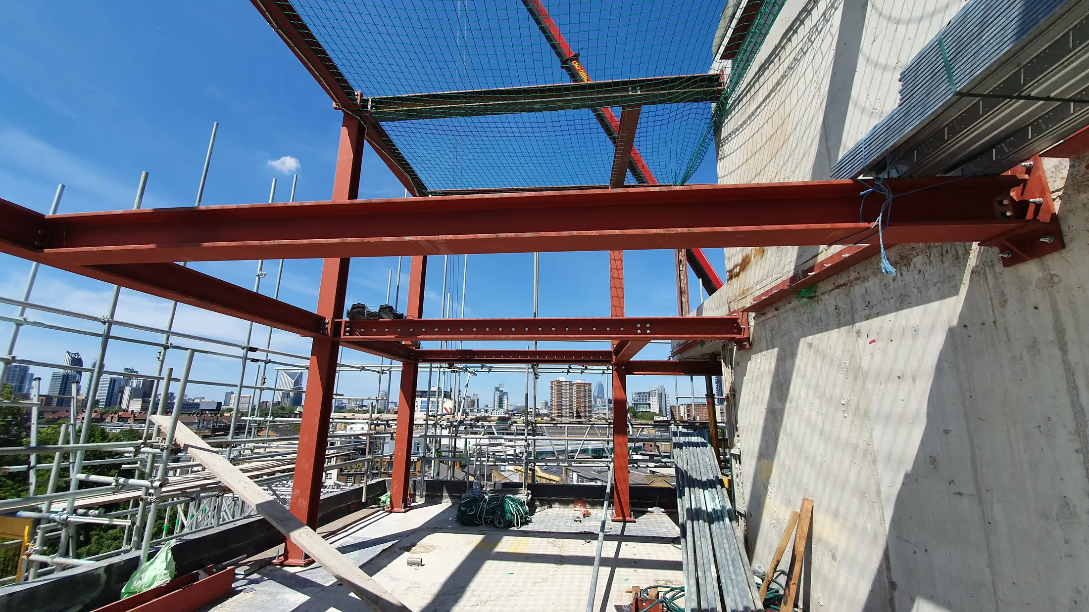 New rooftop steelwork under construction at Tower Bridge Road